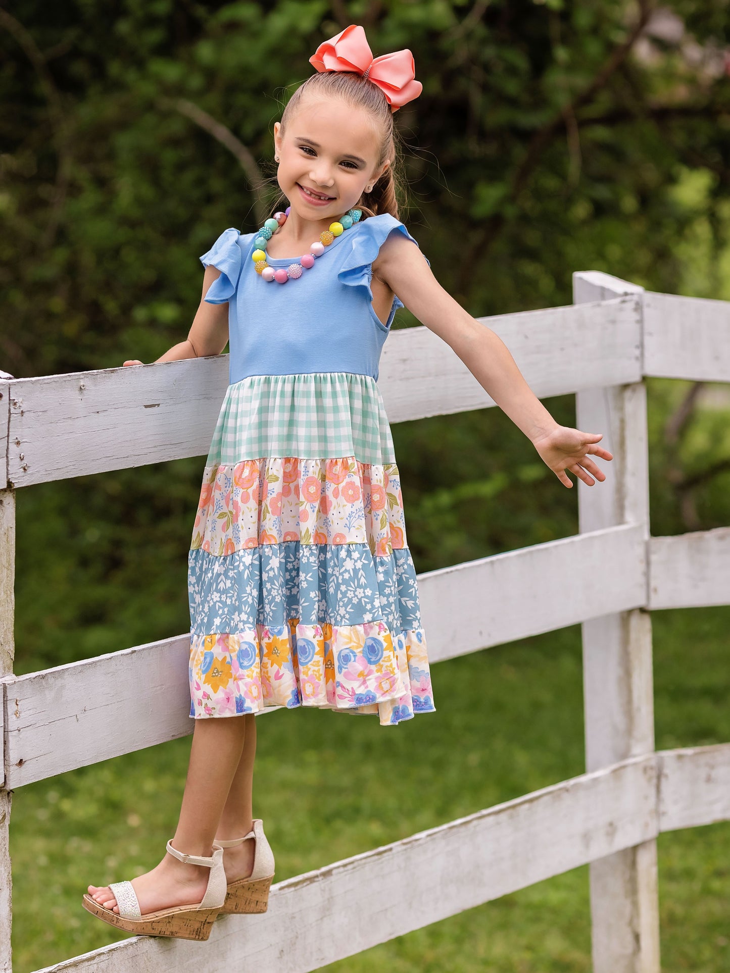 model wearing the Periwinkle Tiered Floral Dress