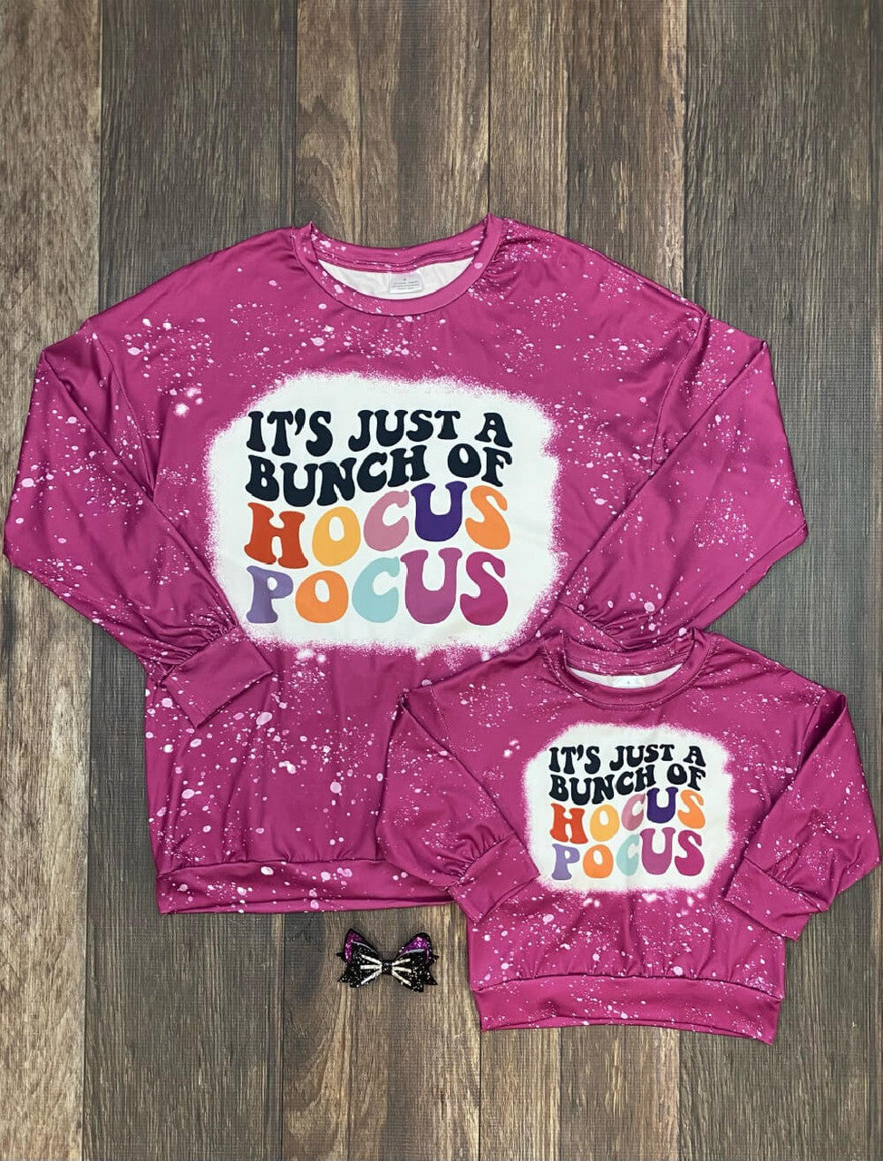 Mommy and Me "It's Just a Bunch of Hocus Pocus" Black and colorful lettering, with white speckled bleach spots and fuchsia long-sleeve top.