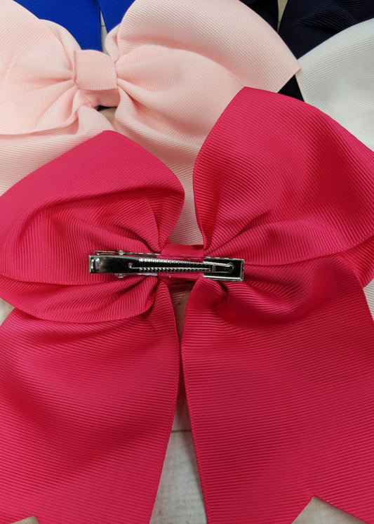 Back of 6 inch solid cheer bow showing alligator clip - Alternative view