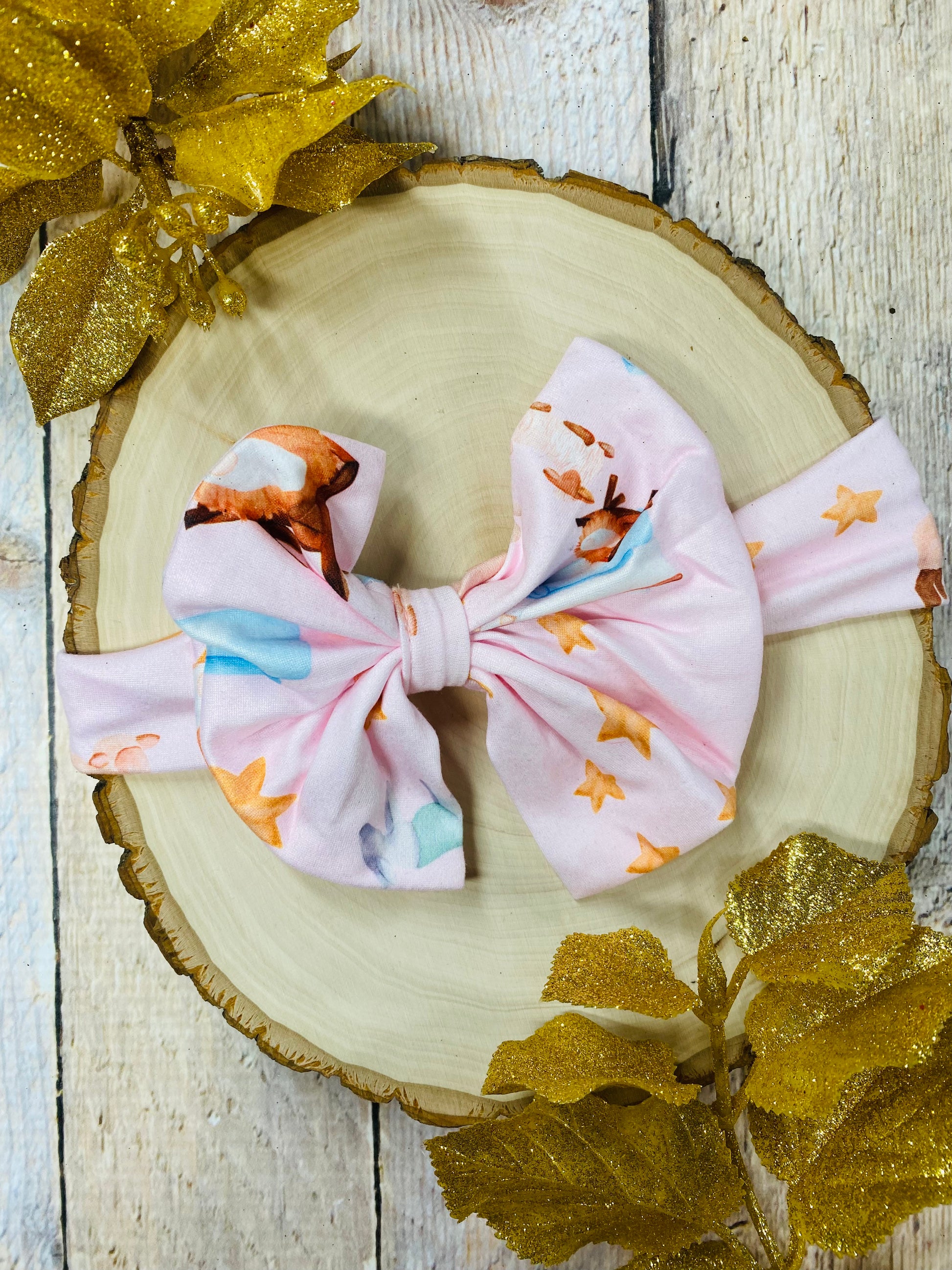 nativity bow headband on wooden display