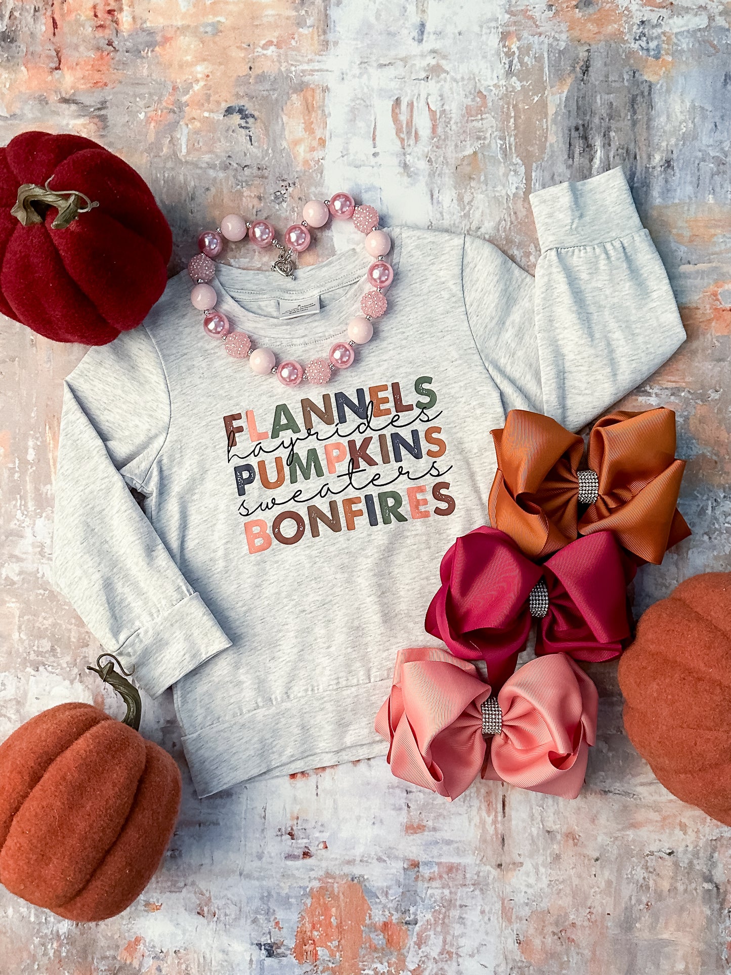 child sized long sleeve "flannels, hayrides, pumpkins, sweaters, bonfires"