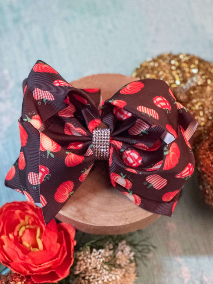 fall hair bow with pumpkins and rhinestone center