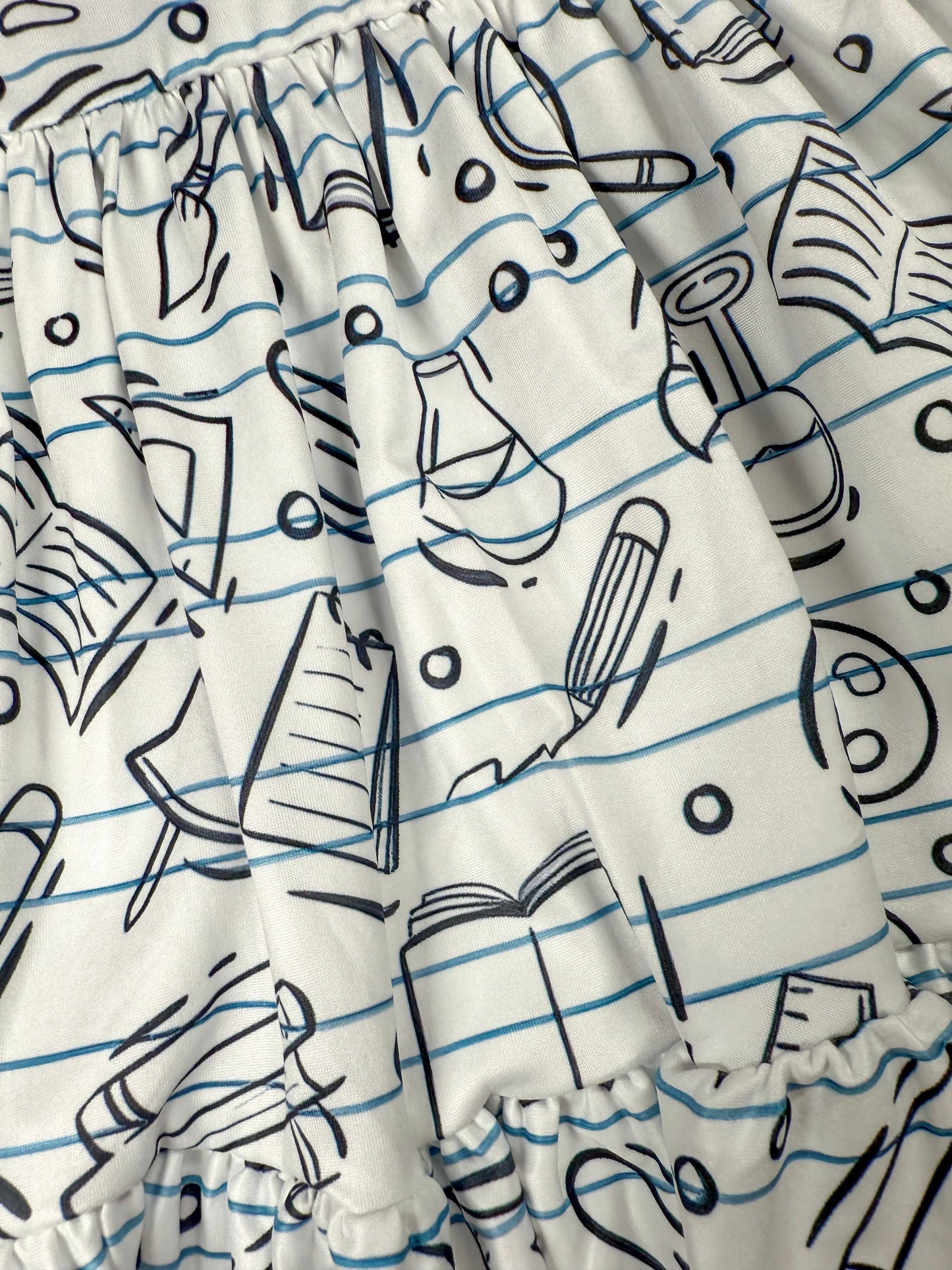 close up photo of the designs on the dress