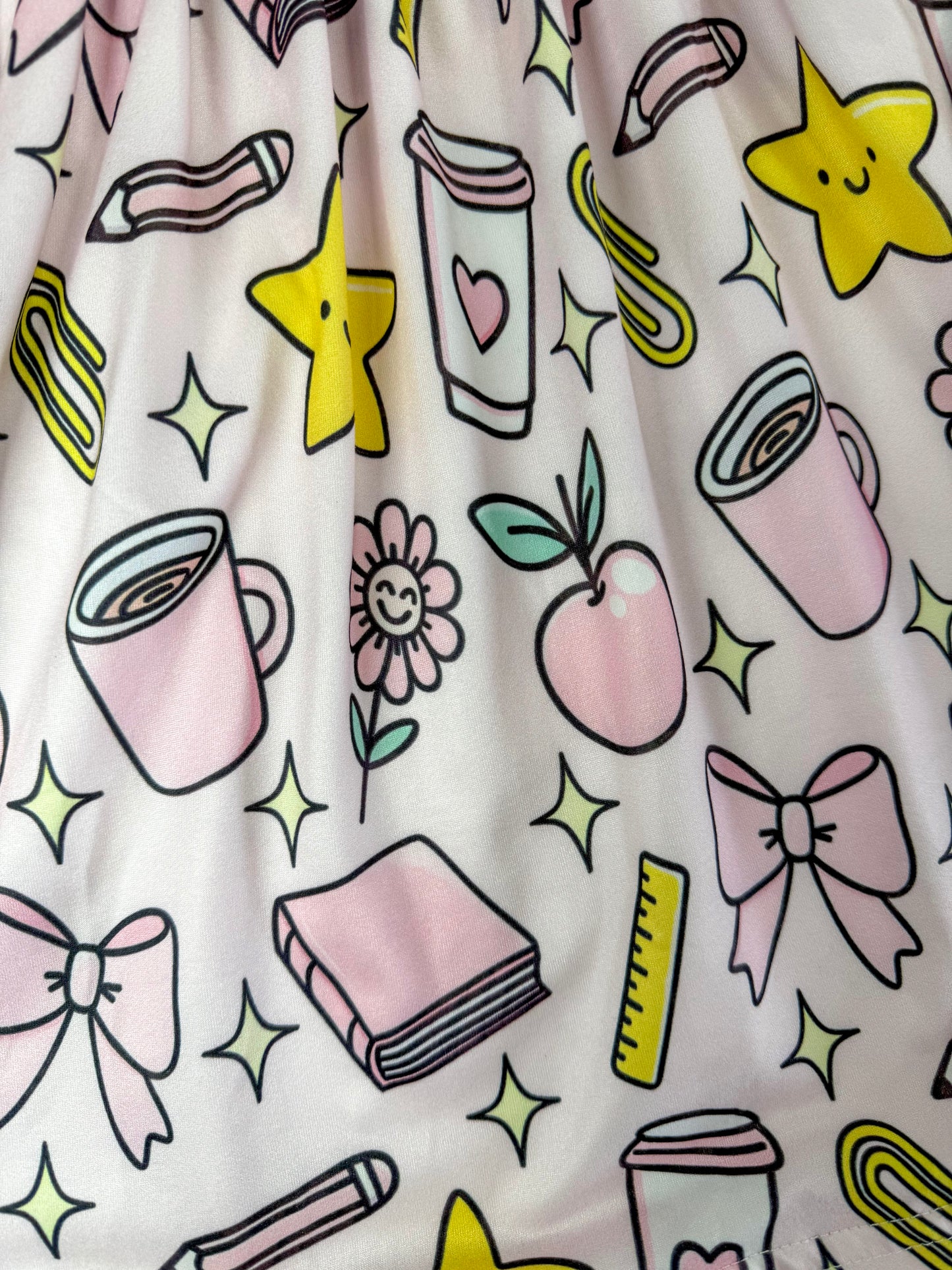 close up photo showing the pattern on the skirt of the dress