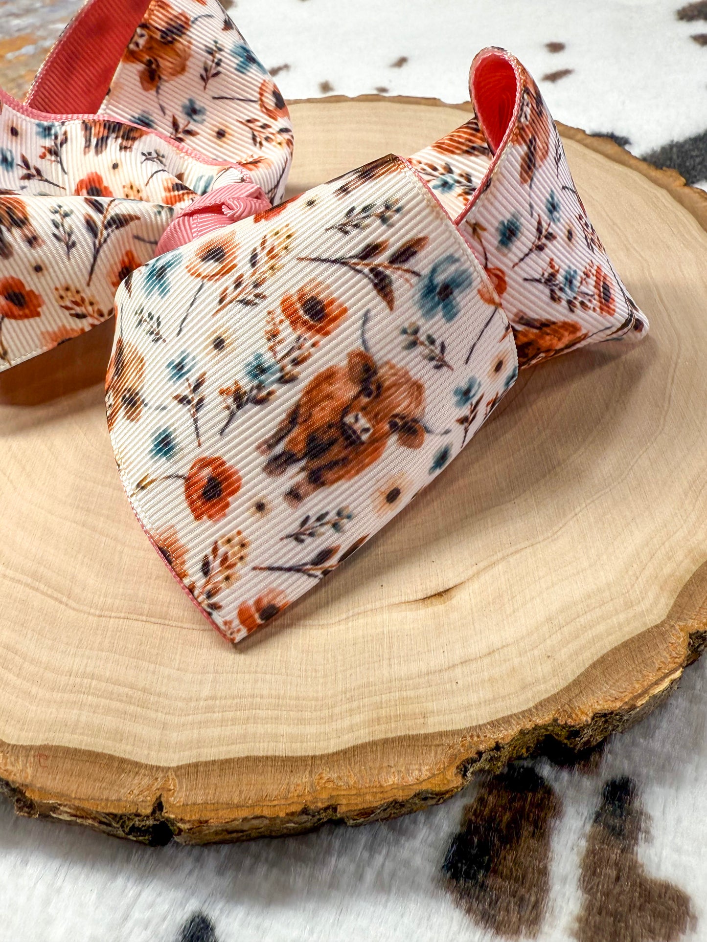 close up of the highland cow and floral pattern