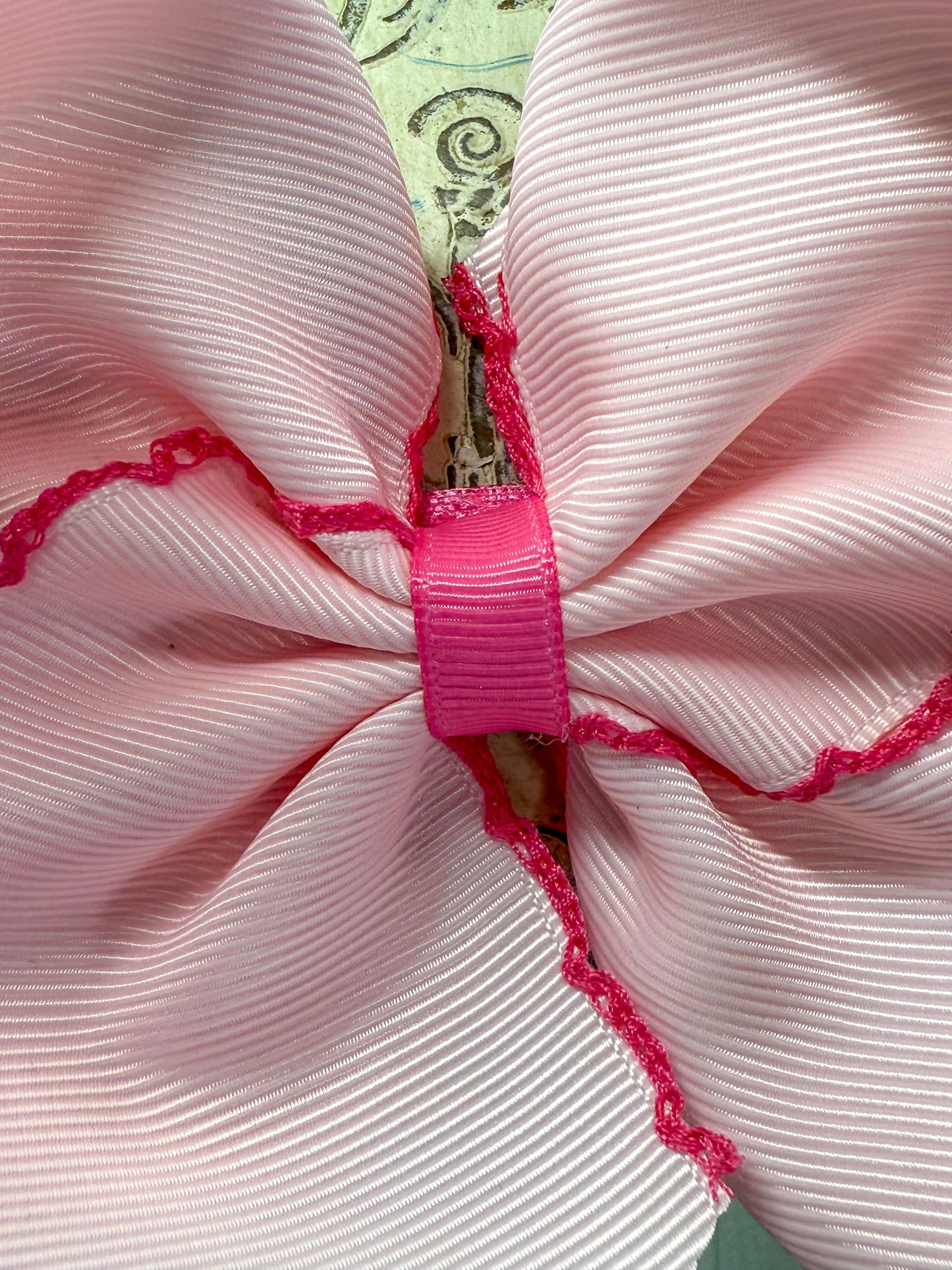 close up photo of the center of the bow on headband