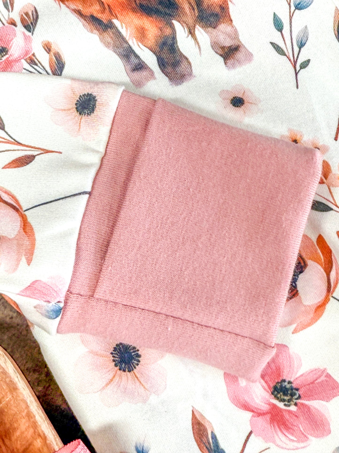 close up of dusty rose sleeve cuff