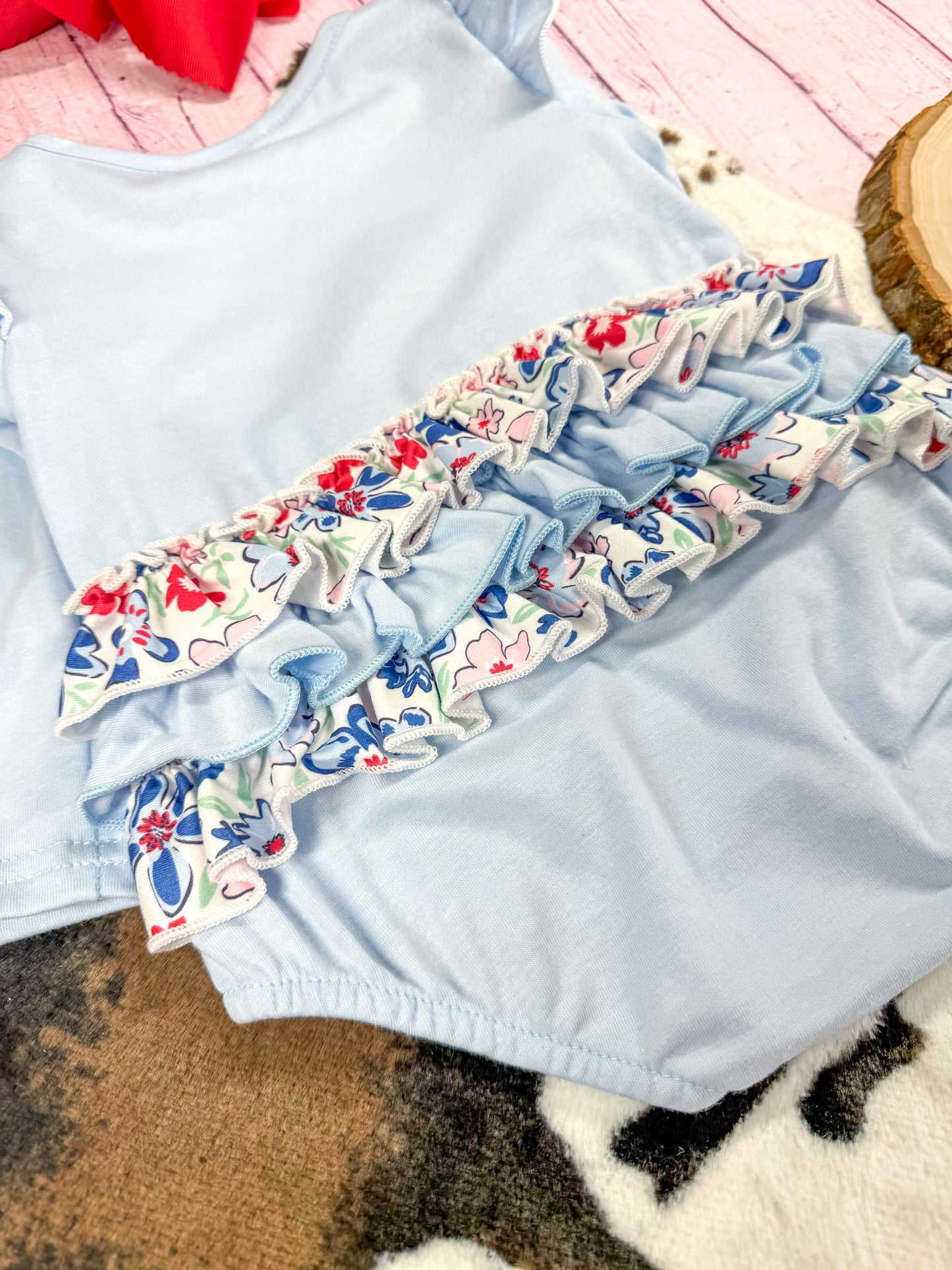 close up of the ruffles on back of romper