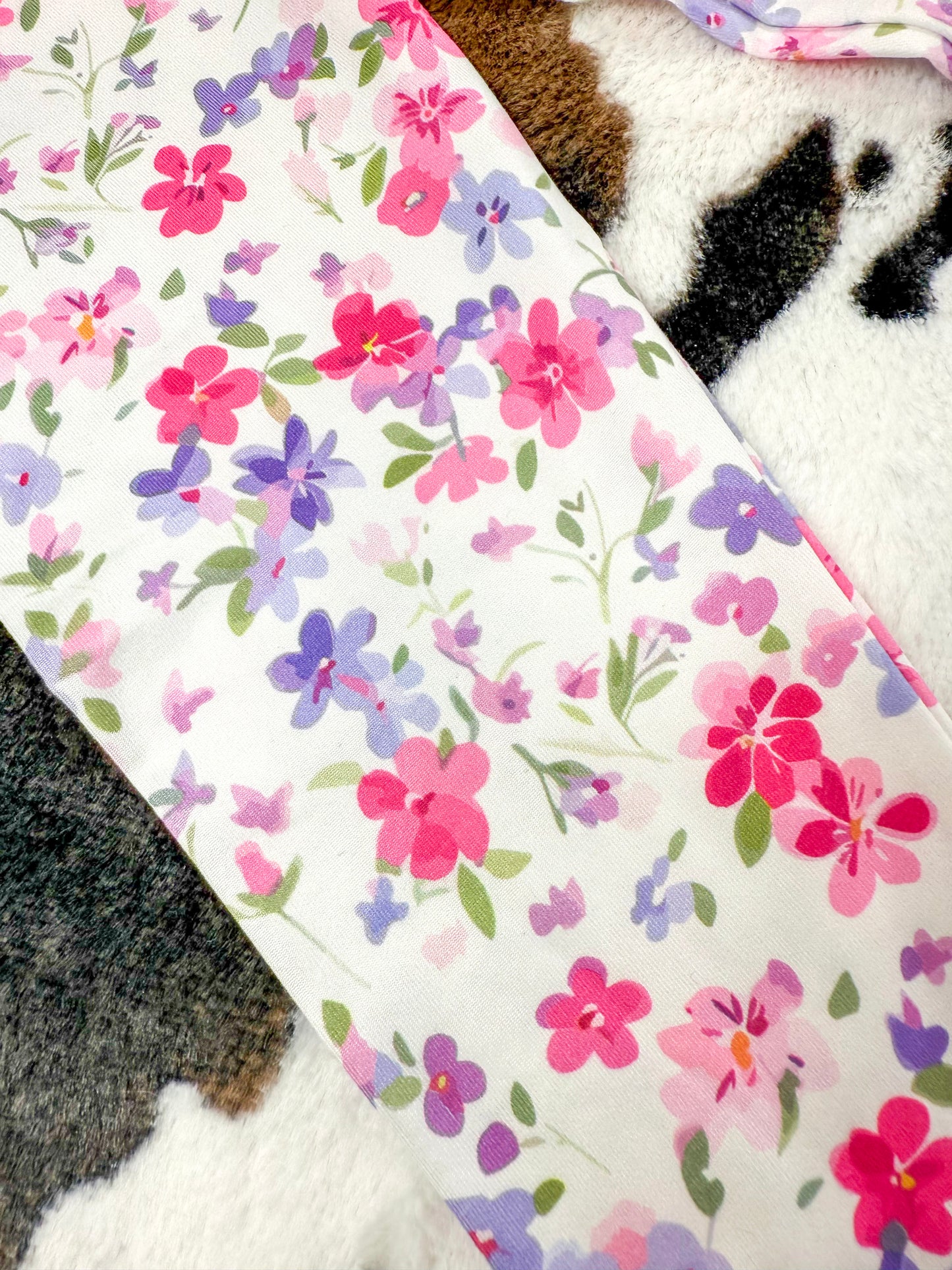 close up of floral pattern on leggings