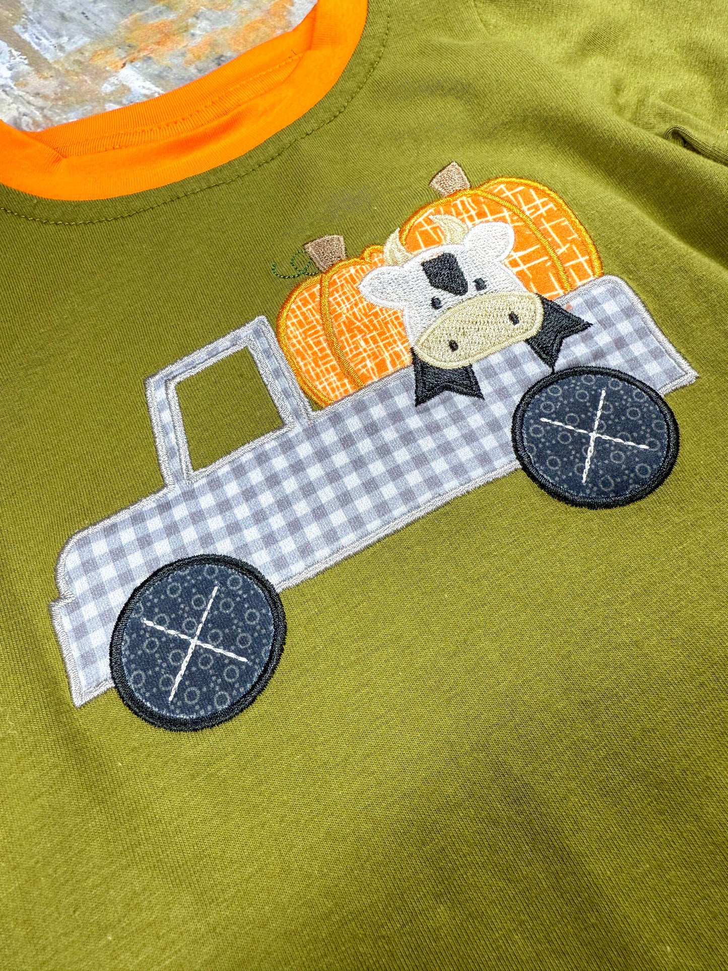 close up of the applique on front of the onesie
