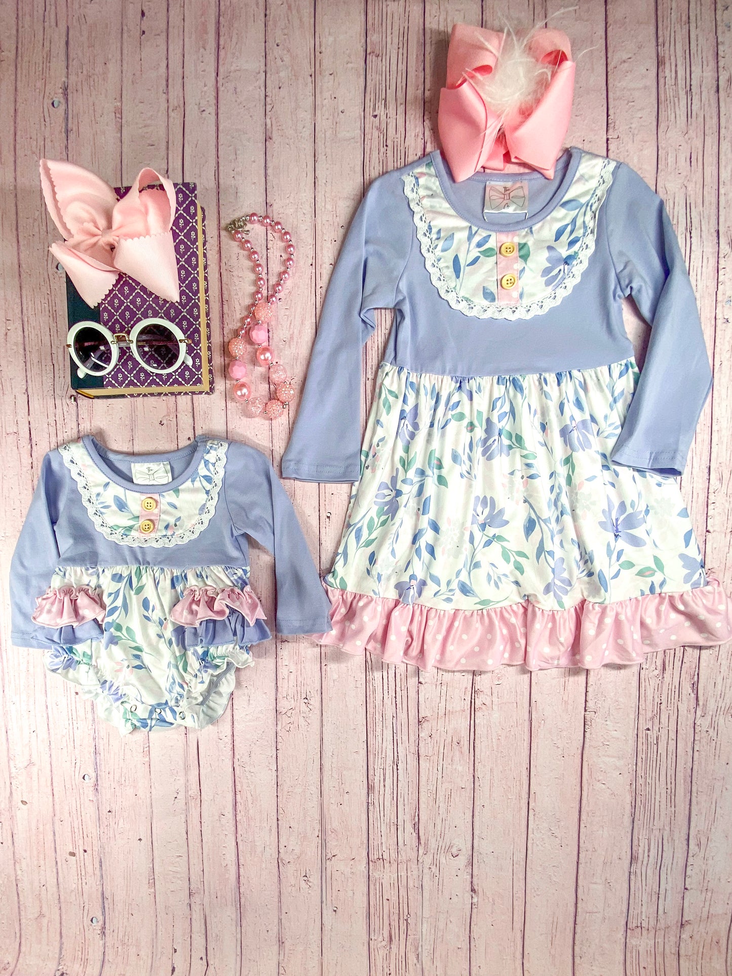 Purple & Pink Floral Tiered Dress next to matching infant onesie