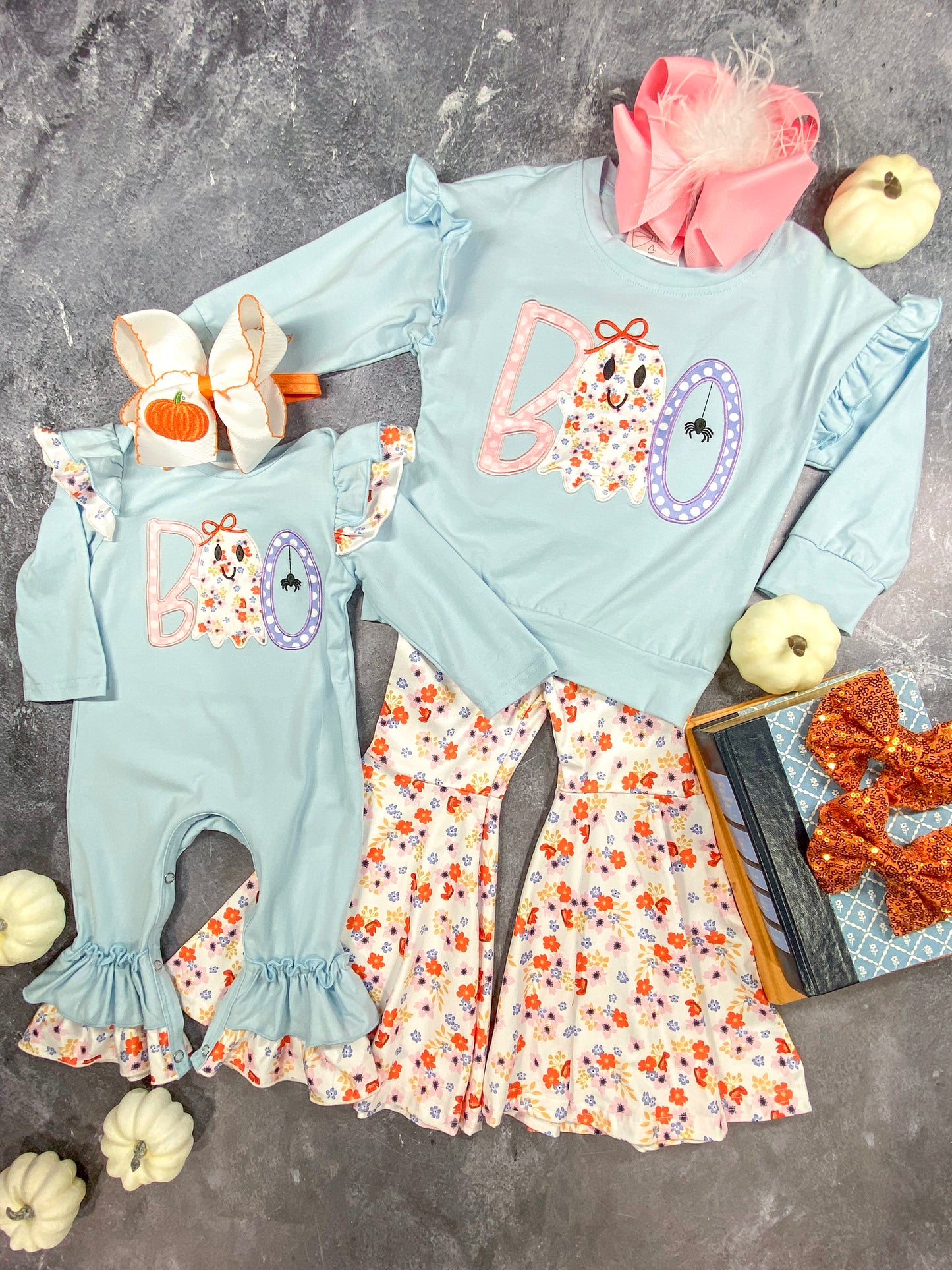 Blue BOO Long Sleeve & Floral Bell Bottoms Set next to matching infant romper