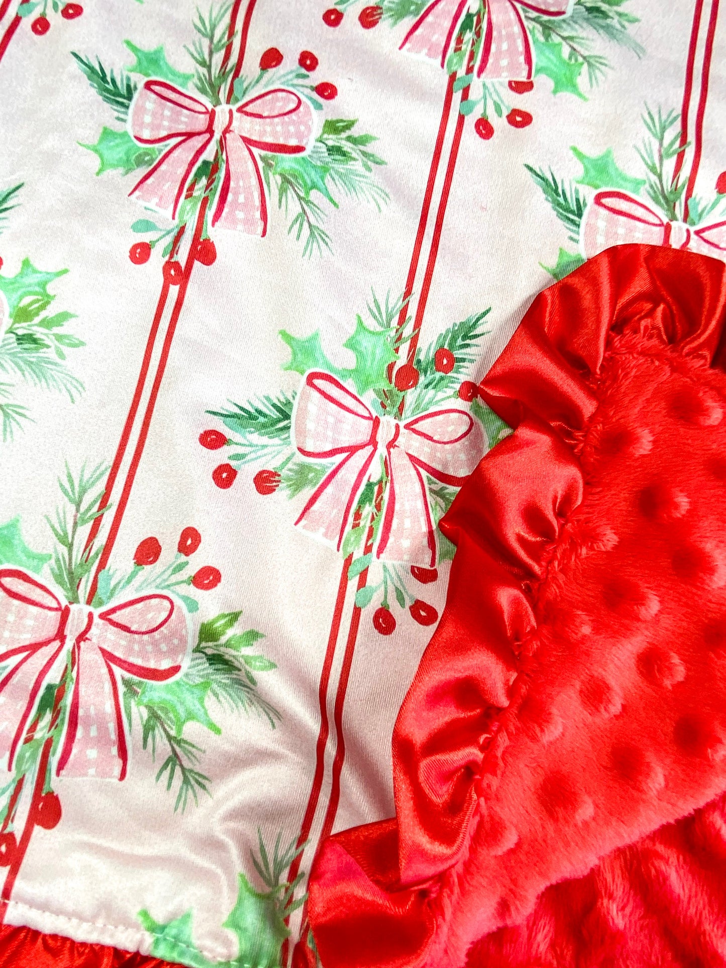 close up of the holly bow and stripes pattern