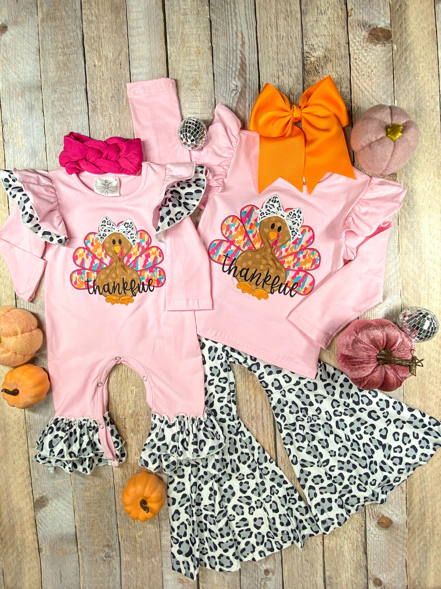Thankful Turkey & Animal Print Bell Bottoms Set next to the matching infant onesie