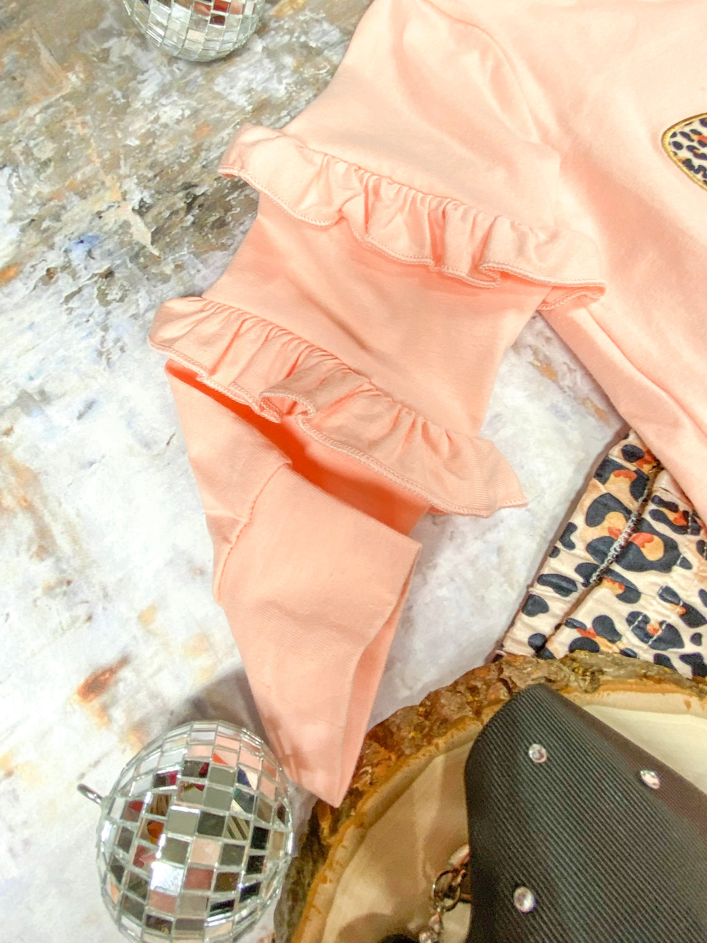 close up of ruffled sleeves