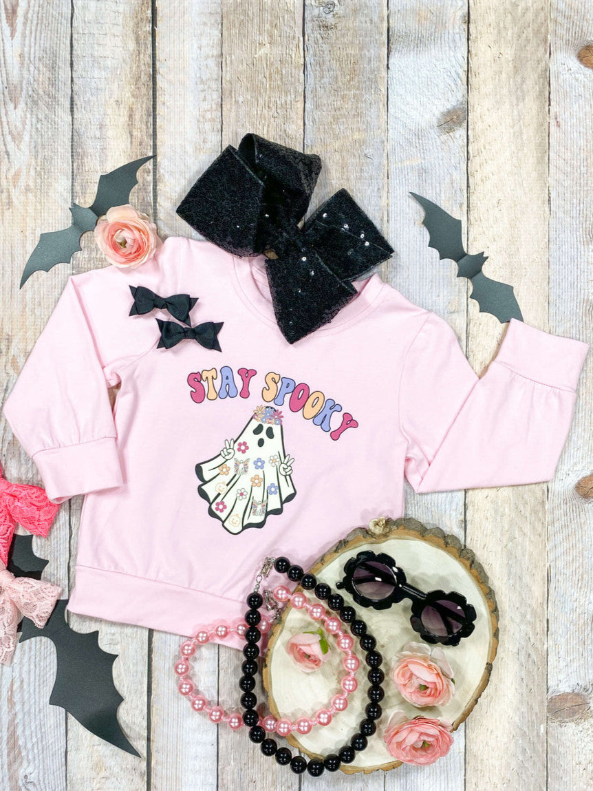 Flat lay of stay spooky top