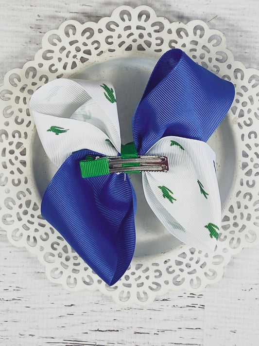 Back of alligator print hair bow showing alligator clip - Alternative view