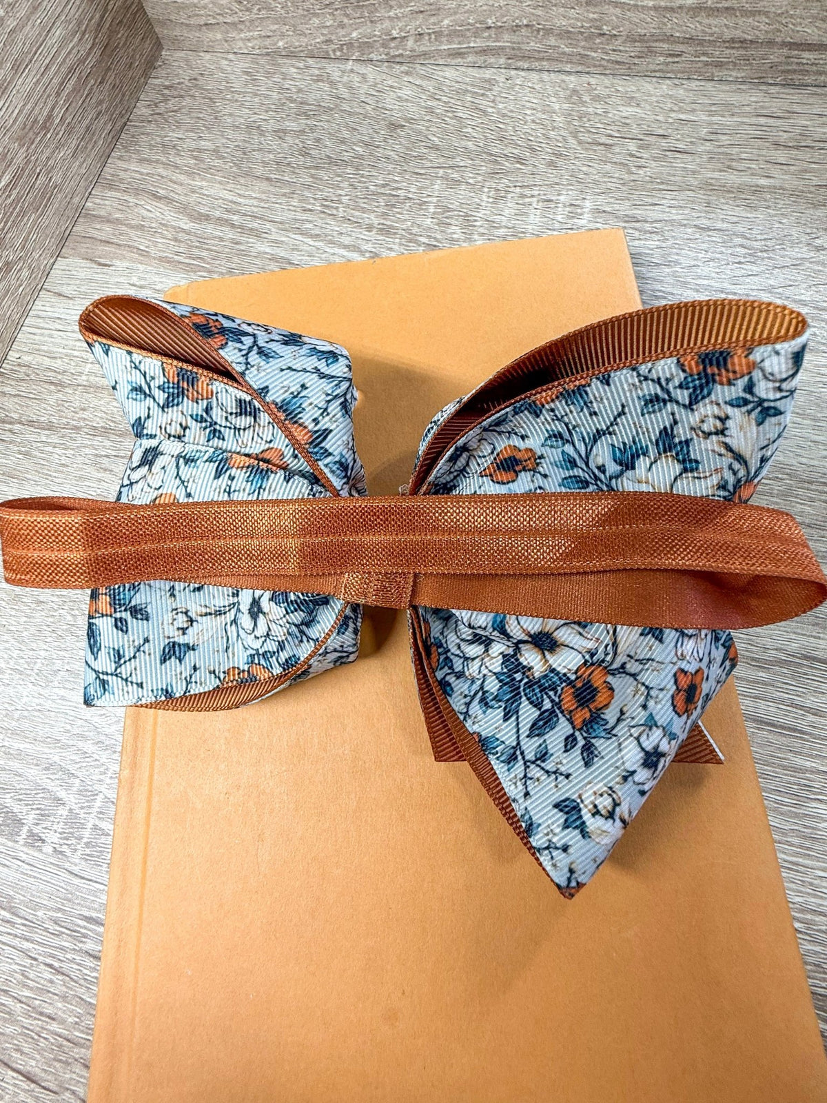 Close-up of autumn whisper floral double layer bow headband