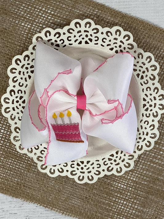 Birthday cake embroidered moonstitch hair bow flat lay - Alternative view