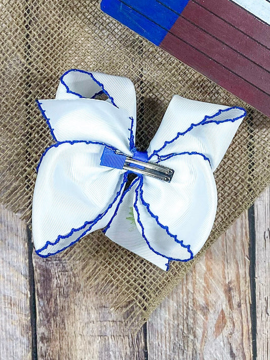 Back of bluebonnets embroidered moonstitch hair bow showing alligator clip - Alternative view