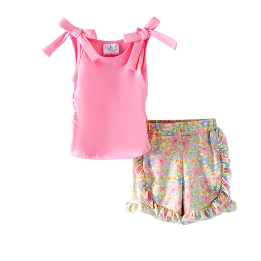Pink top and floral shorts set on a white background - Alternative view