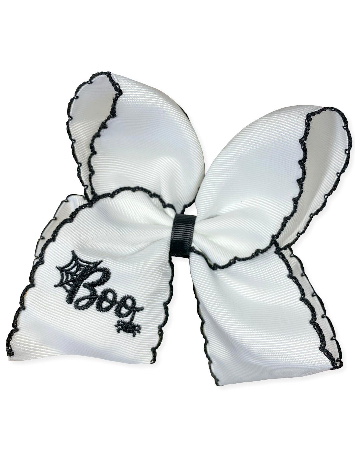 Black and White Boo Halloween Hair Bow on a wooden background
