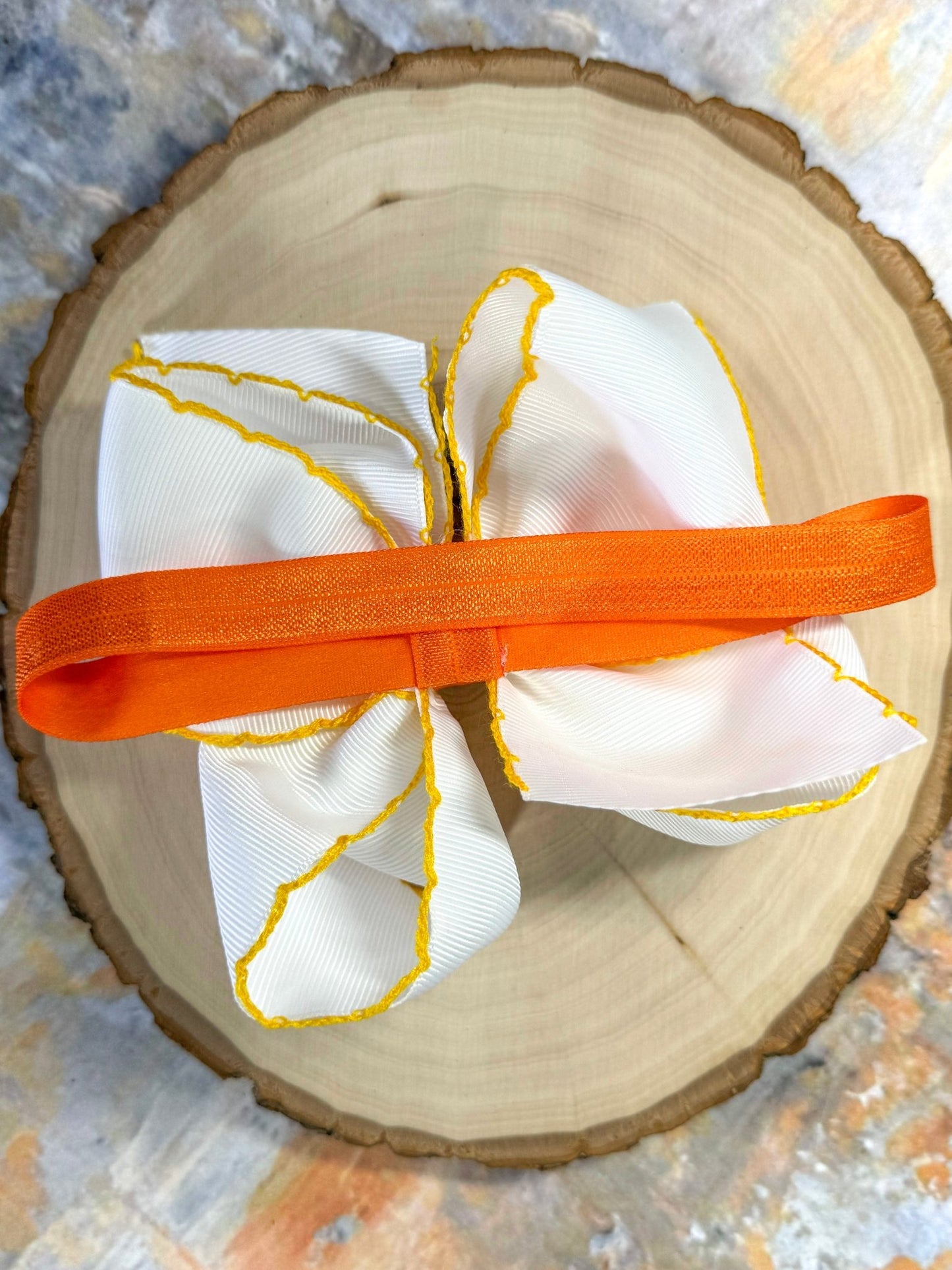 back of the Candy Corn Embroidered Moonstitch Bow Headband