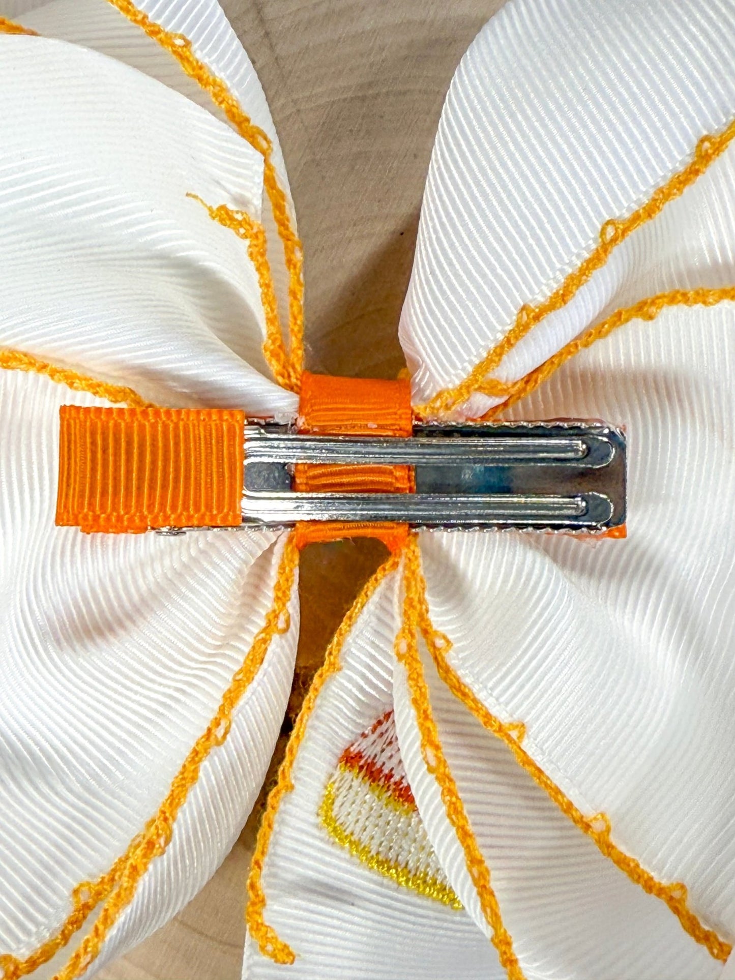 back of the Candy Corn Embroidered Moonstitch Hair Bow