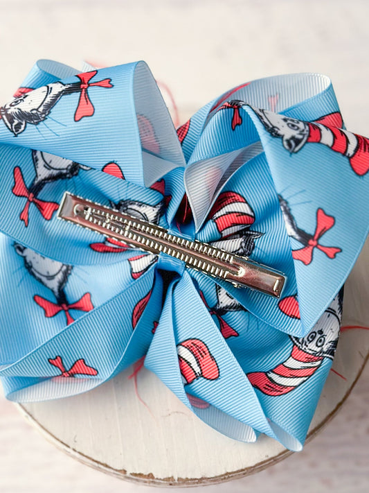 Back of Cat in the Hat feather puff hair bow showing single prong alligator clip - Alternative view