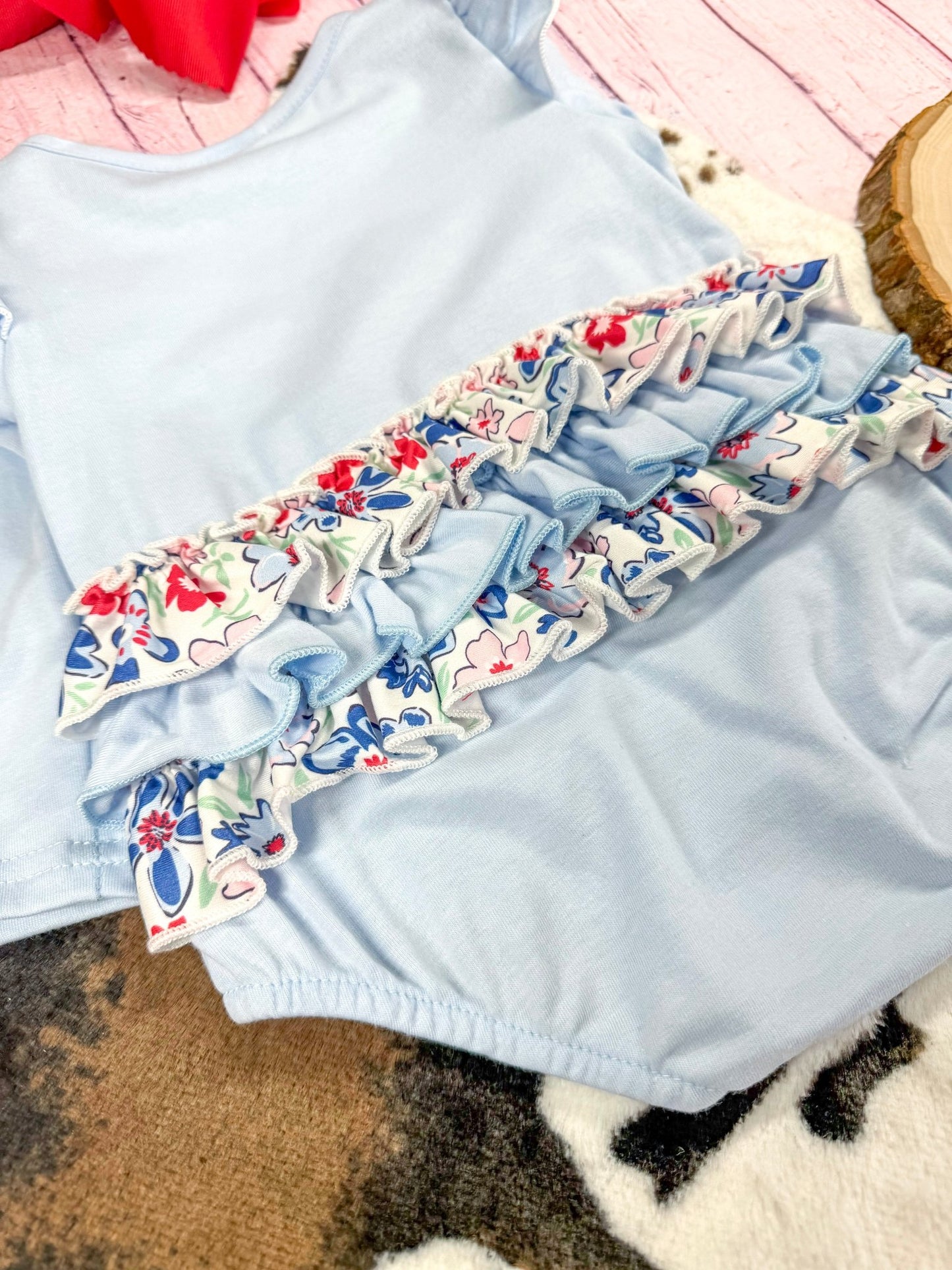 close up of the ruffles on back of romper