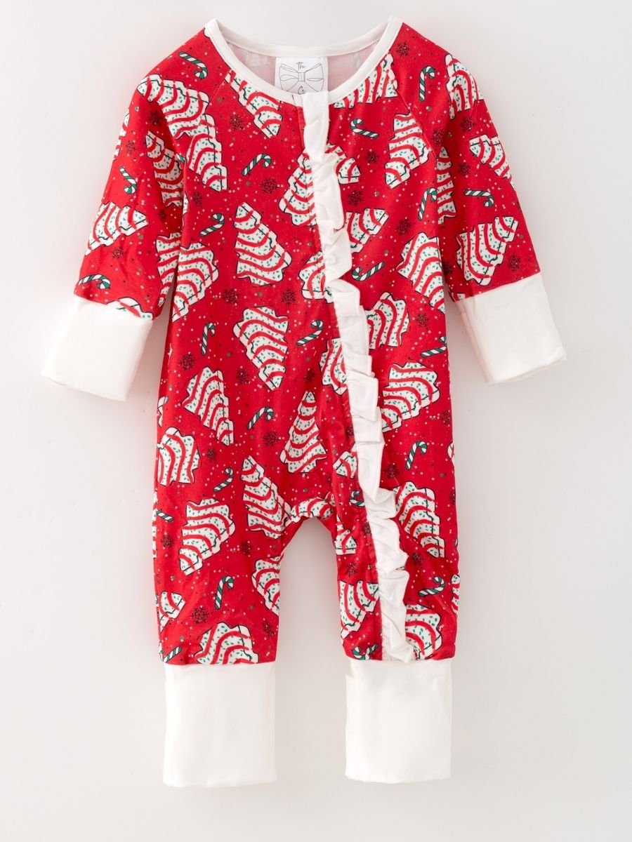 Baby girls Christmas tree cake ruffle romper in soft poly spandex with festive red holiday print and white ruffles.