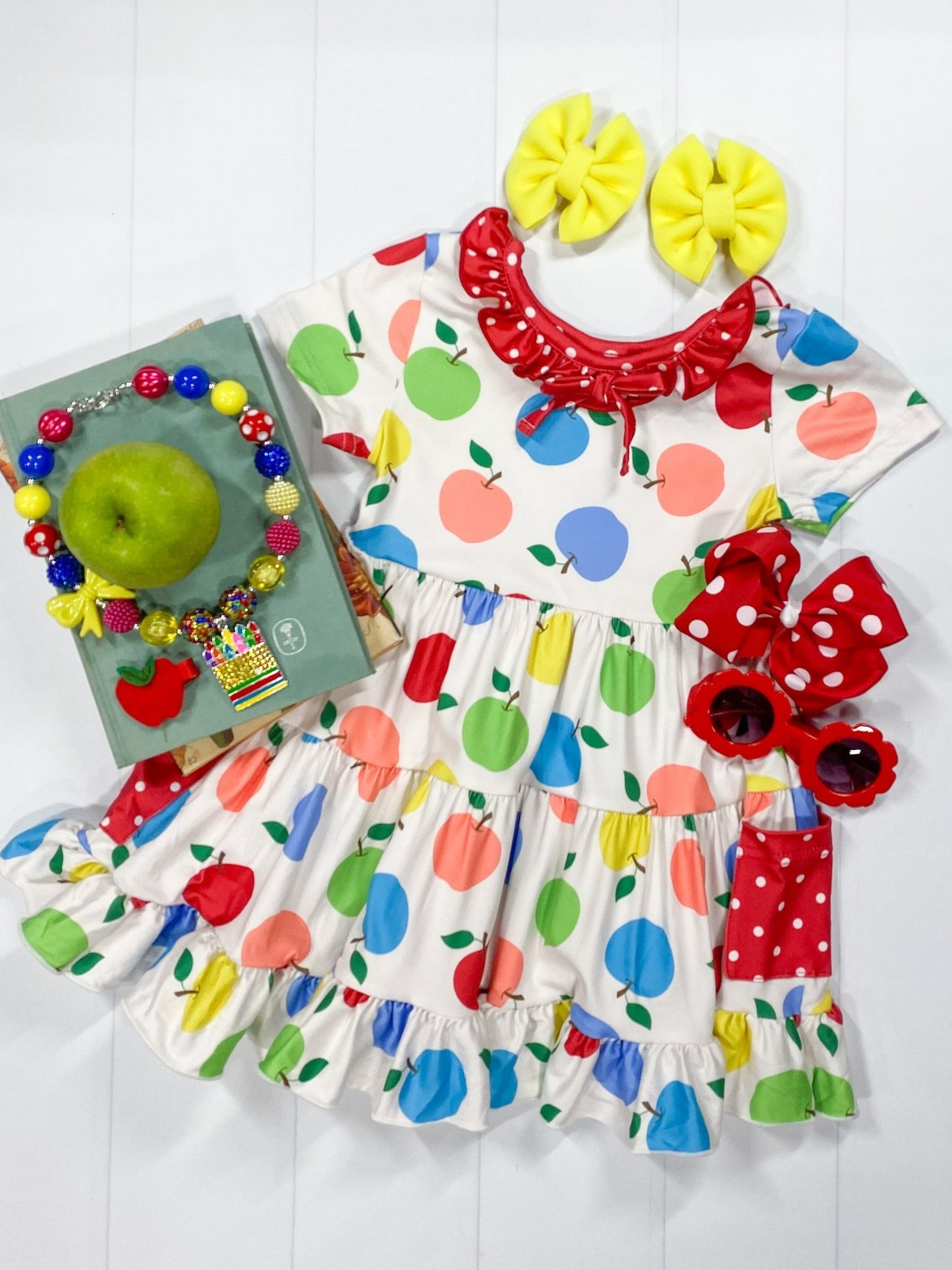 twirl dress with colorful apples on it