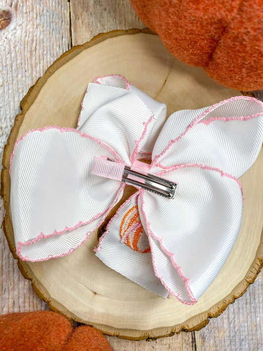 Back of coquette pumpkin embroidered moonstitch hair bow showing alligator clip - Alternative view
