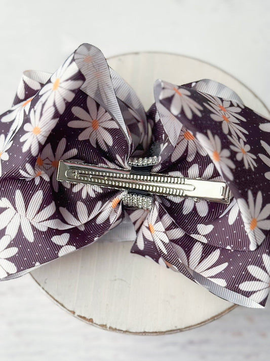 Back of daisies and dots hair bow showing single prong alligator clip - Alternative view