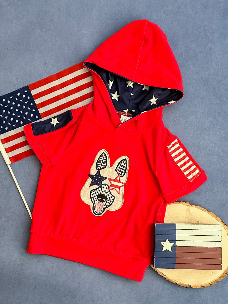 red hoodie with american dog