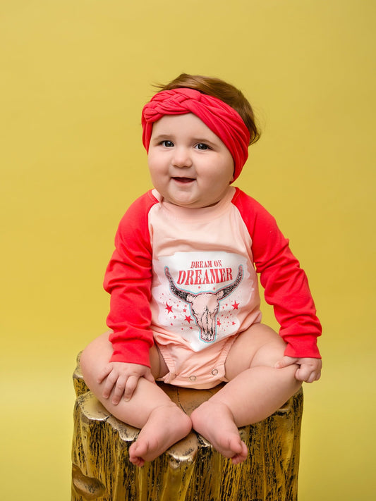 Baby wearing the Dream On Dreamer onesie - Alternative view