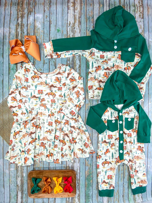 Children's green hooded outfit with animal print on a wooden surface - Alternative view