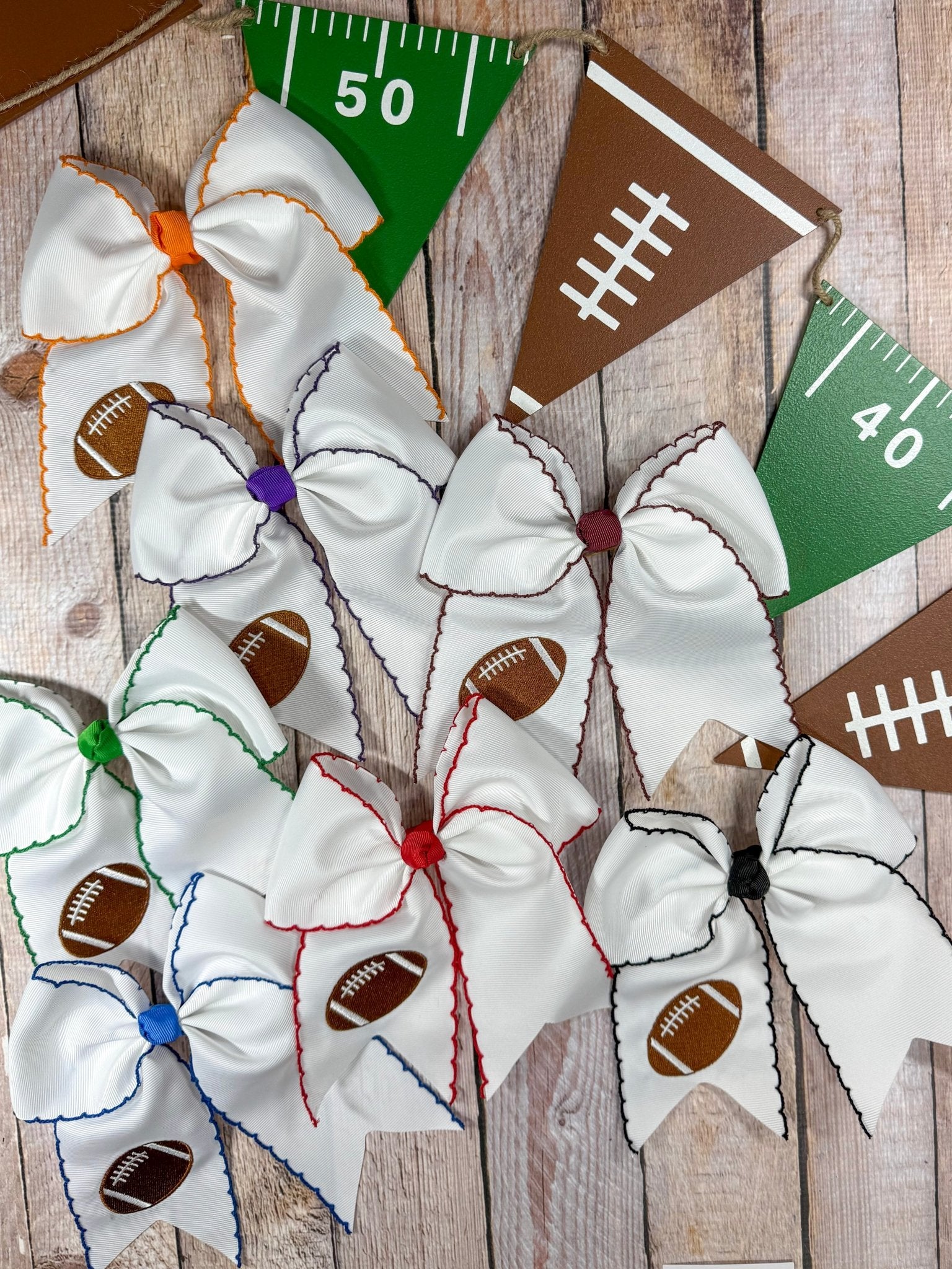 assortment of Football Embroidered Moonstitch Cheer Bows