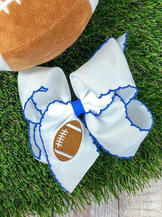 White football embroidered moonstitch hair bow with blue stitching - Alternative view