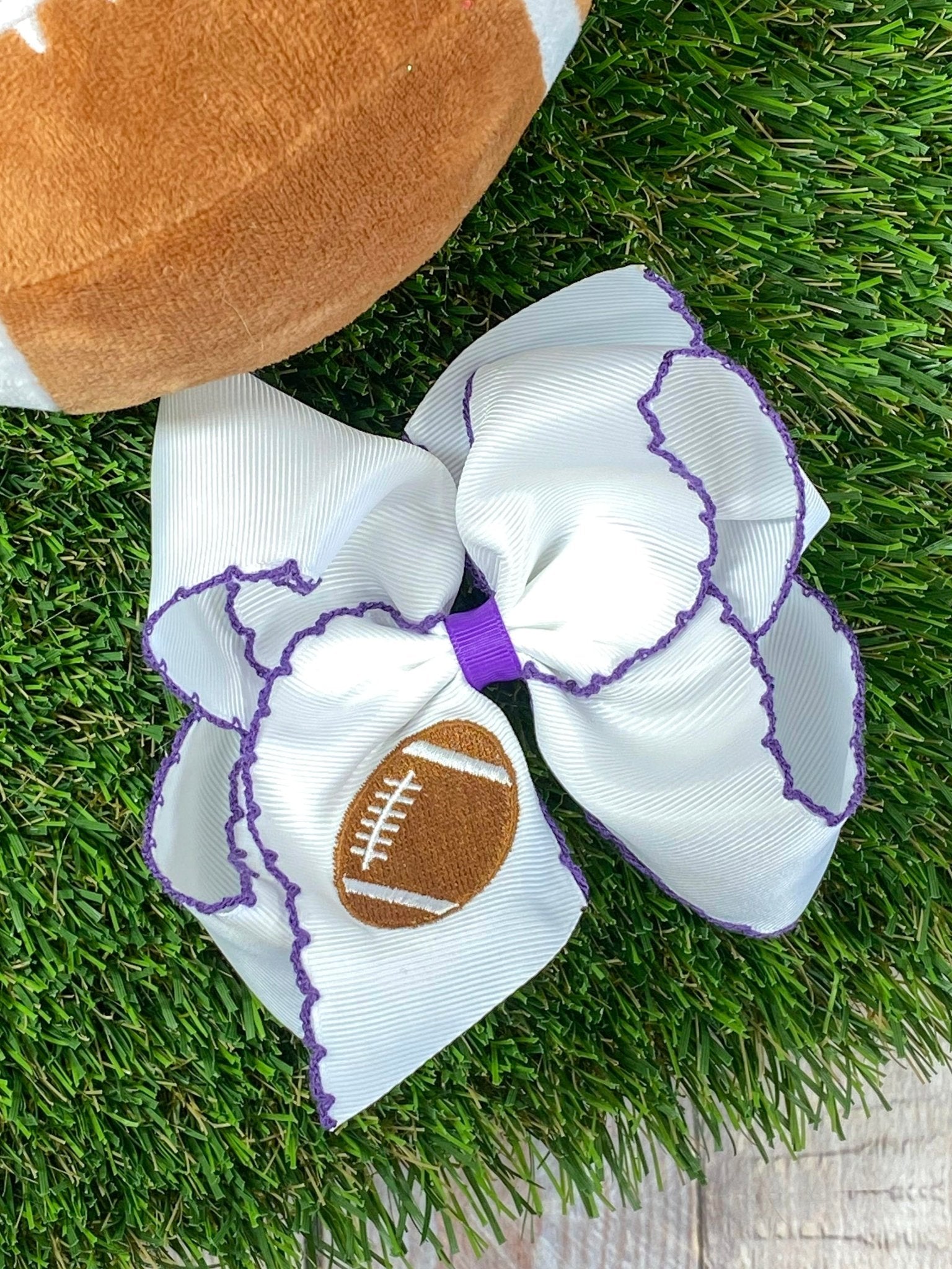 white with purple Football Embroidered Moonstitch Hair Bow