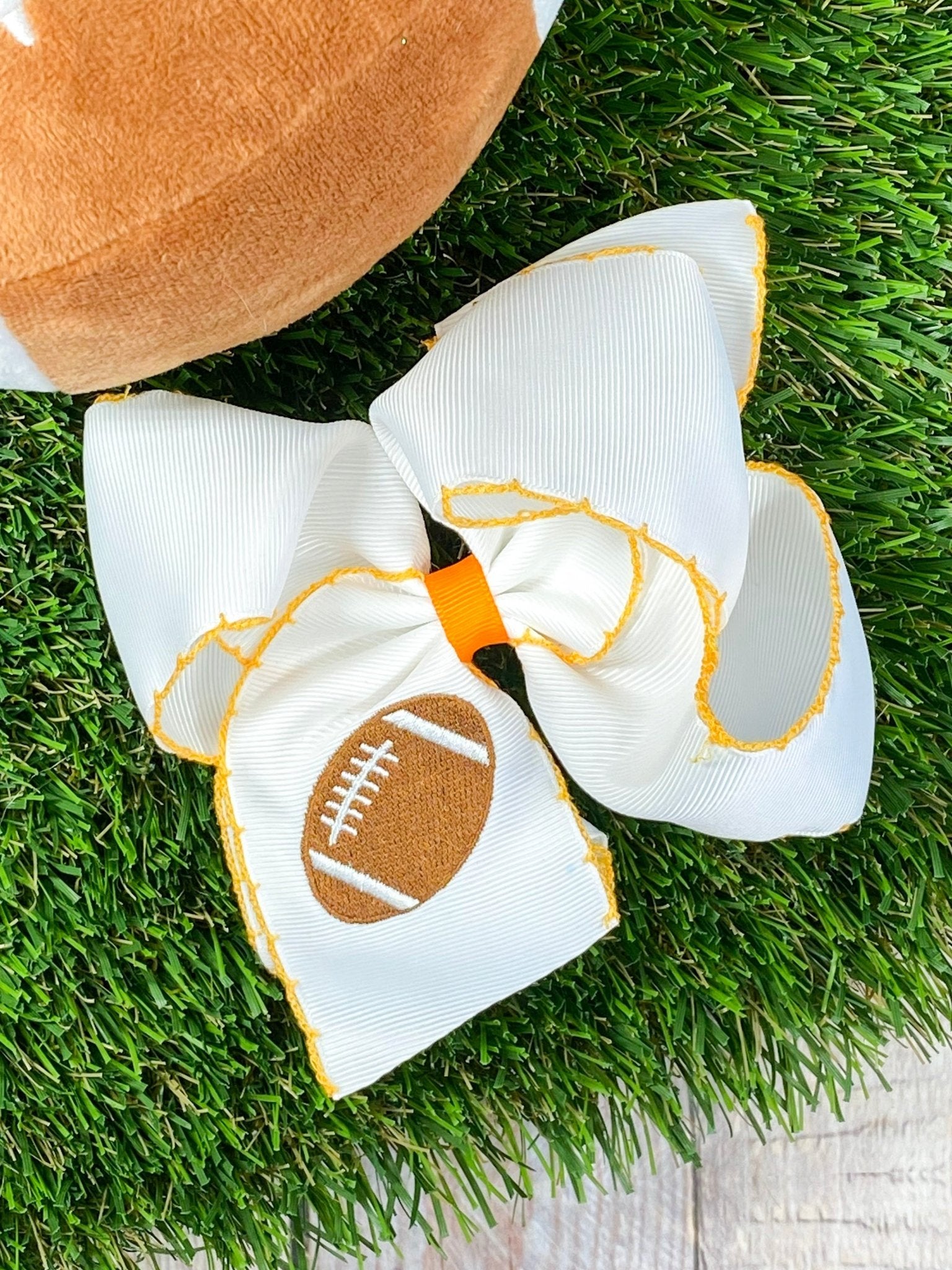 white with orange Football Embroidered Moonstitch Hair Bow