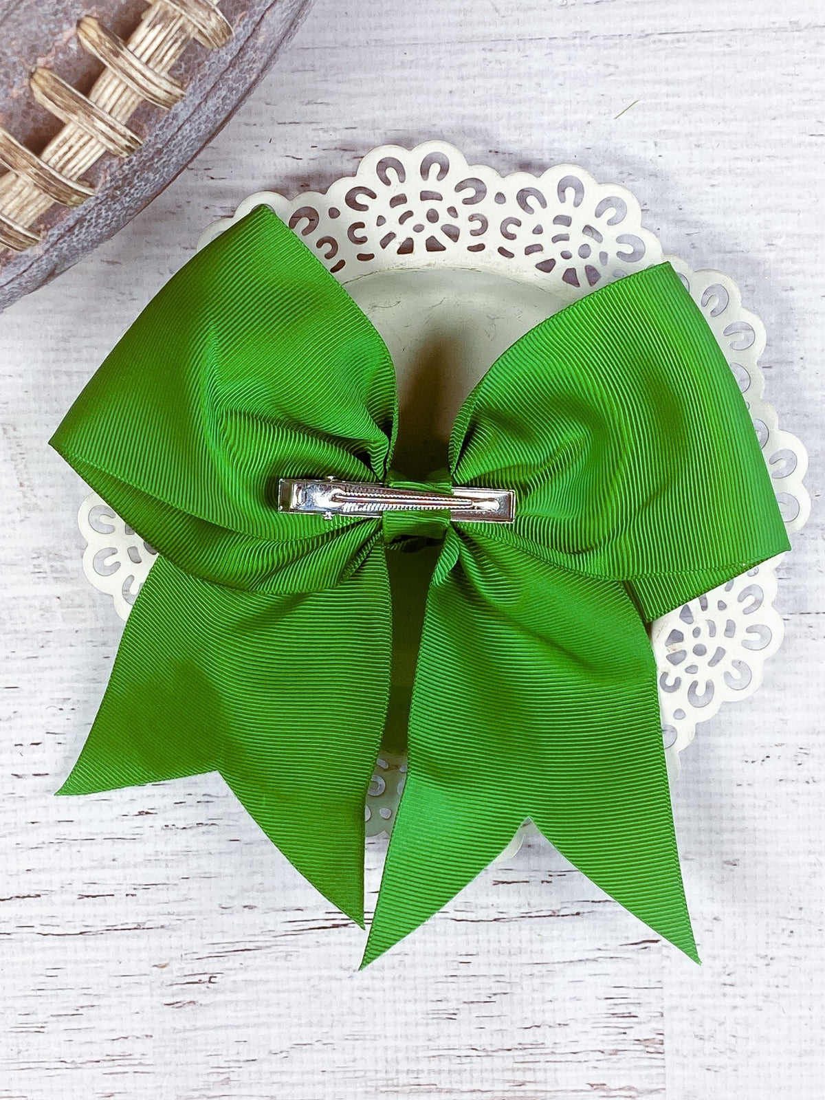 Back of Gilmore Gators solid green cheer bow