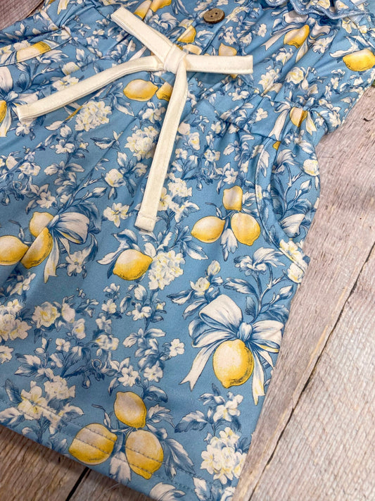 lemon print on romper on wood background - Alternative view