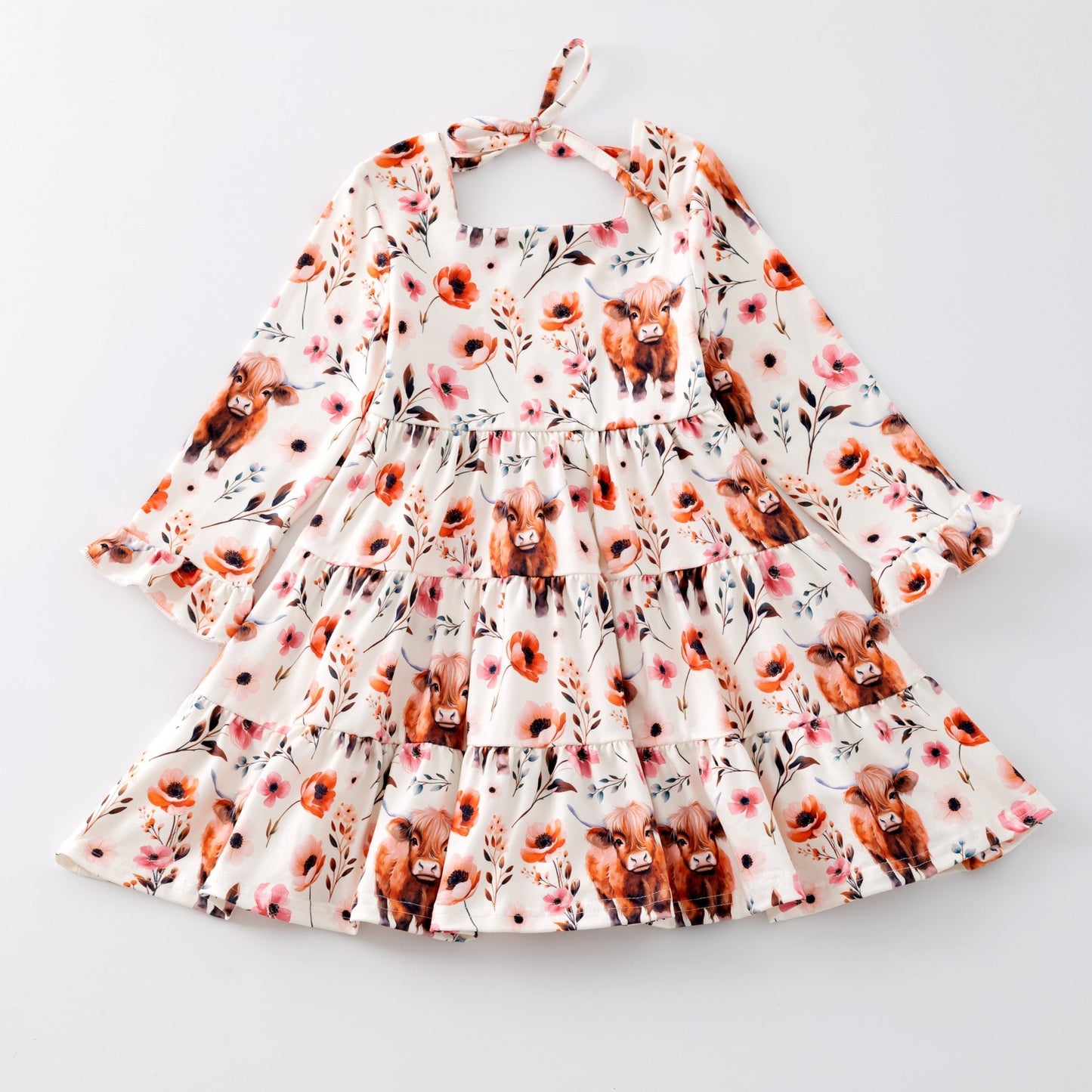 Floral dress with animal print on a light gray background