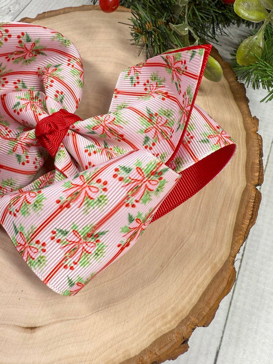 Close-up of holly, bows and stripes print on double layer hair bow - Alternative view