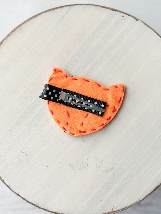 Back of orange fox felt clippie showing single prong alligator clip - Alternative view