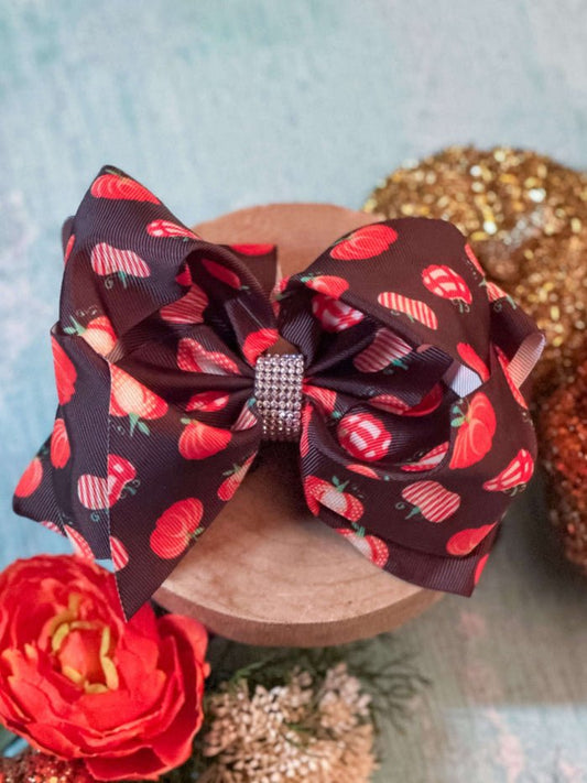 fall hair bow with pumpkins and rhinestone center