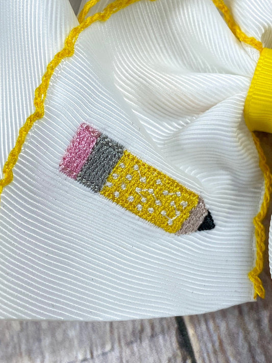 Close up of pencil embroidery on moonstitch hair bow - Alternative view