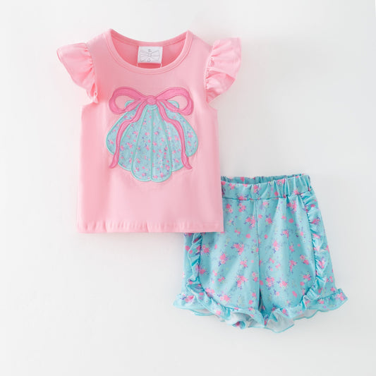 Girls sea shell outfit with pink top and blue shorts on a white background - Alternative view