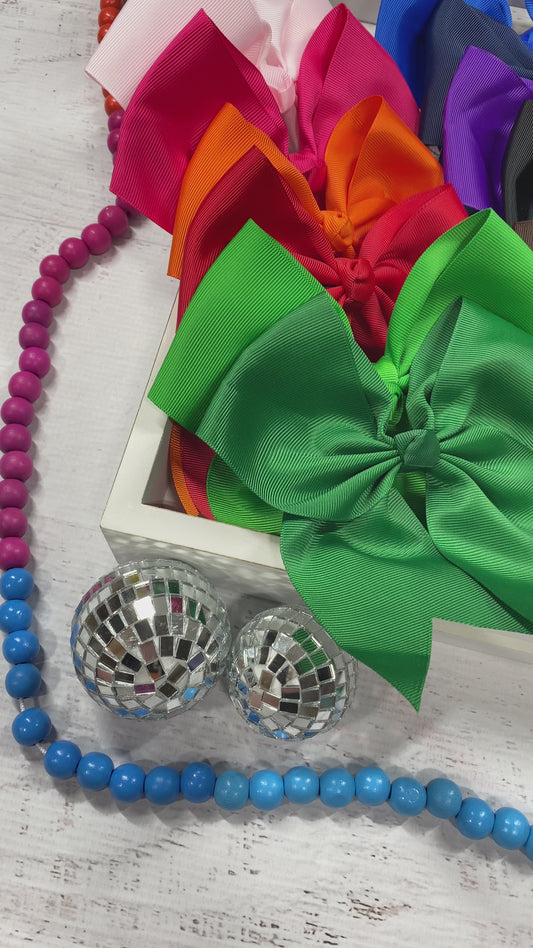 video of solid color cheer bows in different color options - Alternative view